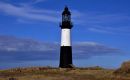 Pr&oacute;ximo al Faro del Cabo Pembroke e incluir&aacute; una campana de bronce de un barco, montada en un arco de acero a similitud al Arco de Huesos de Ballenas en Stanley