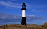 Pr&oacute;ximo al Faro del Cabo Pembroke e incluir&aacute; una campana de bronce de un barco, montada en un arco de acero a similitud al Arco de Huesos de Ballenas en Stanley